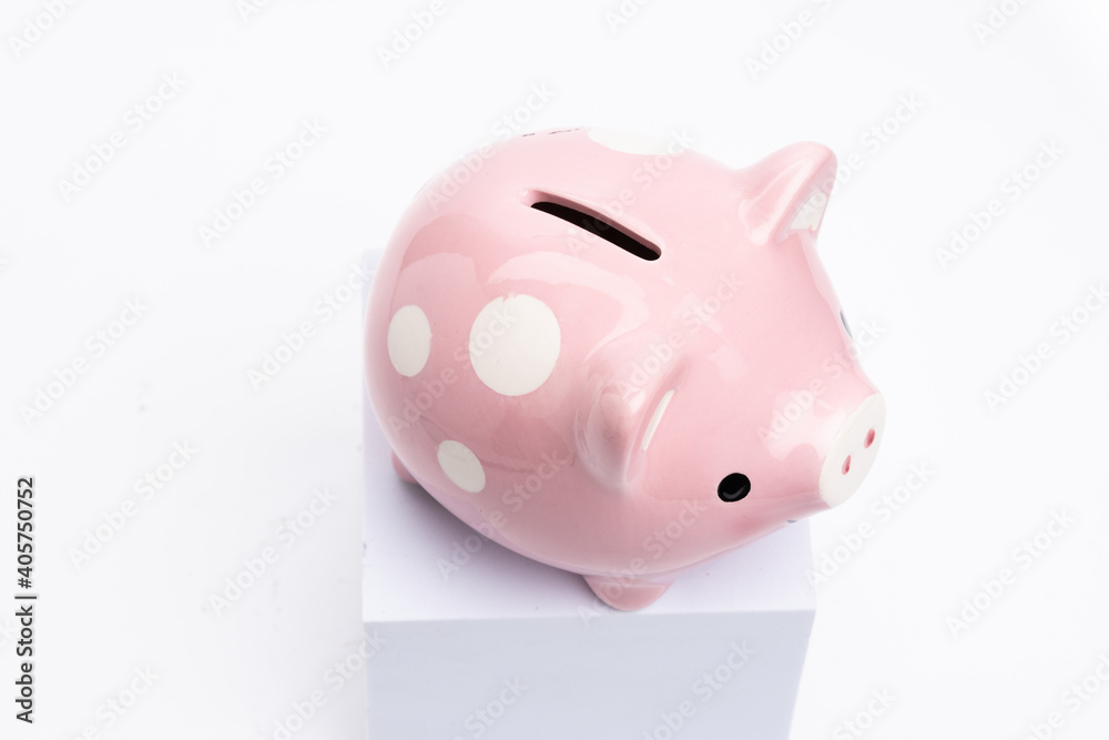 Savings concept. Piggy bank on white background Savings concept. Piggy bank on white background