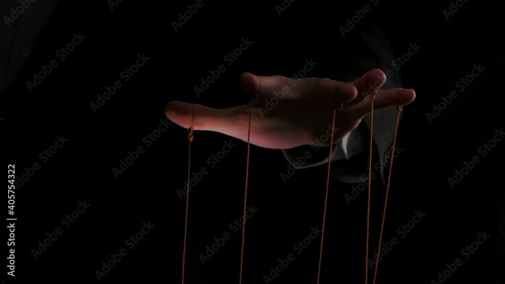 Puppet Master controls and manipulates the puppets with strings ...