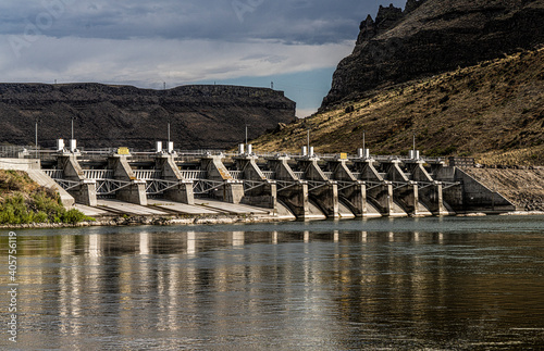 Swan Falls Dam is a concrete gravity type dam built on the Snake River near Murphy Idaho in 1901.