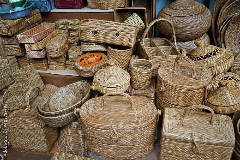 Balinese handmade rattan bags in a local souvenir market, Shops and Market on the Street in Ubud , Bali Island, Indonesia