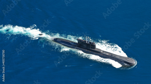 Aerial drone photo of latest technology armed diesel powered submarine cruising half submerged deep blue ocean sea © aerial-drone