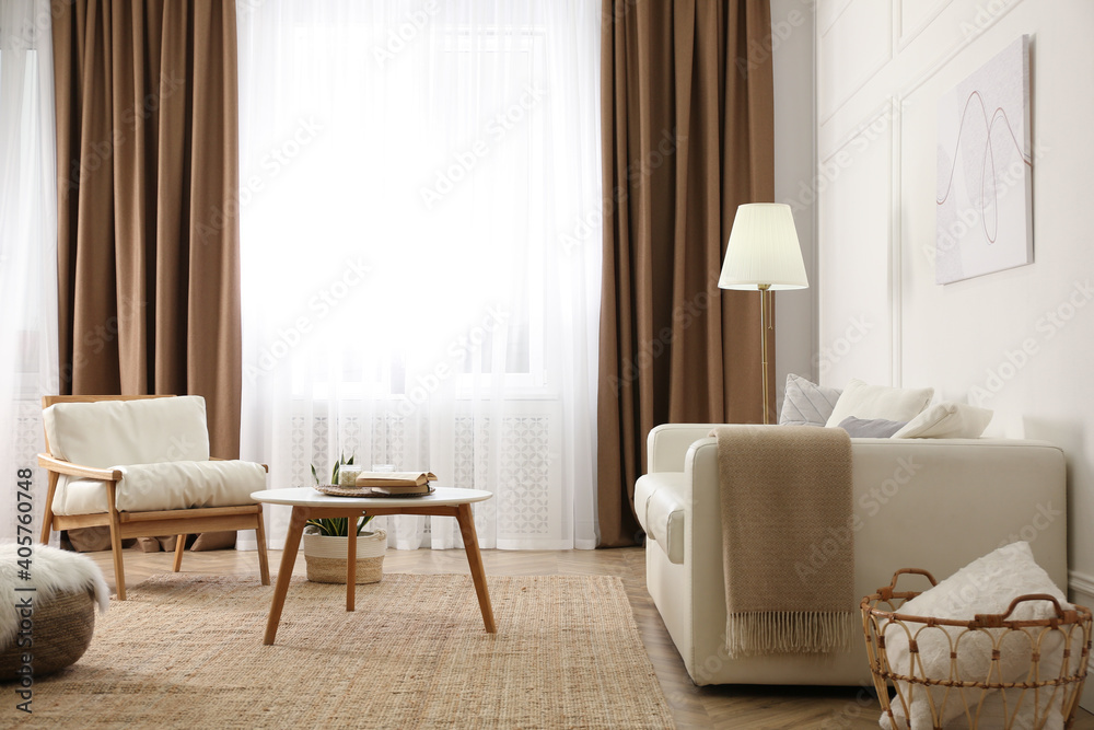 © New Africa - Modern furniture and window with curtains in stylish room interior © New Africa - Modern furniture and window with curtains in stylish room interior