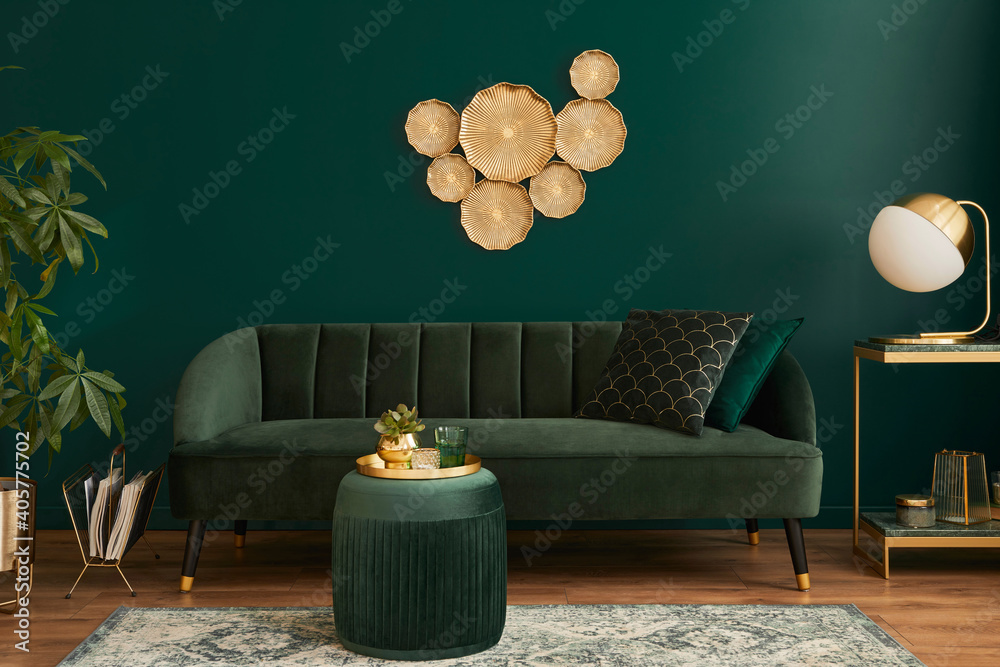 Luxury living room in house with modern interior design, green velvet sofa,  coffee table, pouf, gold decoration, plant, lamp, carpet and elegant  personal accessories. Template. Stock Photo | Adobe Stock