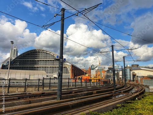 Photographie Tram Railroad Tracks Against Sky At Deansgate Castlefield Manchester Tram Statio