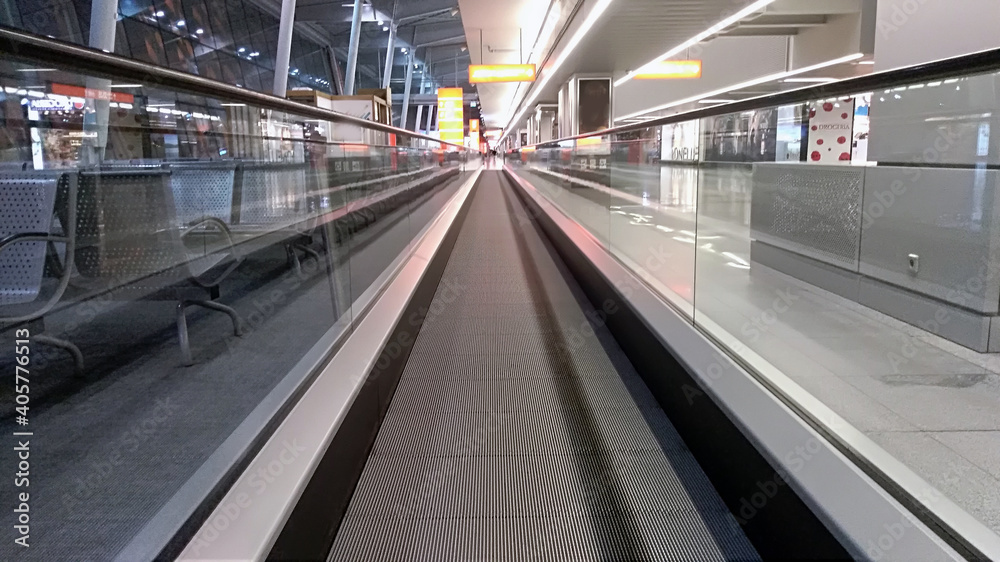 horizontal escalator at the airport/ details of a slidewalk, or moveator at an airport.