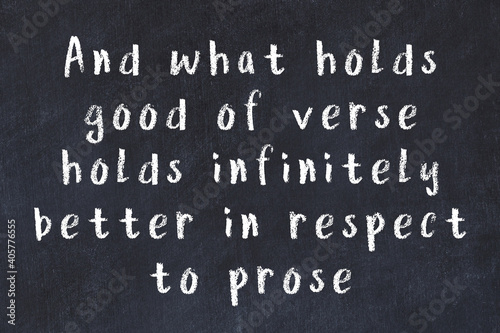 Black chalkboard with wise inscription on it