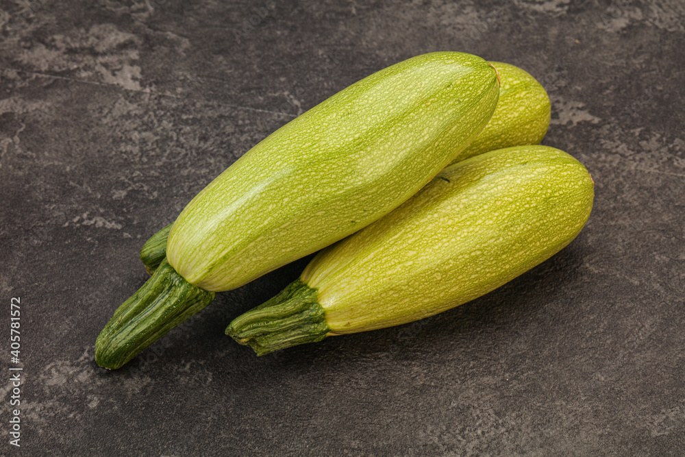 Young tasty zucchini over board Young tasty zucchini over board