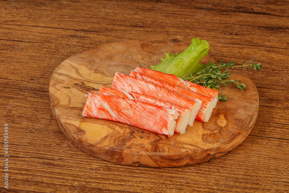 Crab sticks served salad leaves Crab sticks served salad leaves