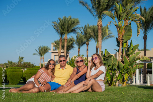 Real people concept, beautiful family, two teenage girls, mother and father happiness and nice body for enjoyed people live an lifestyle, smile and walk together in vacation.