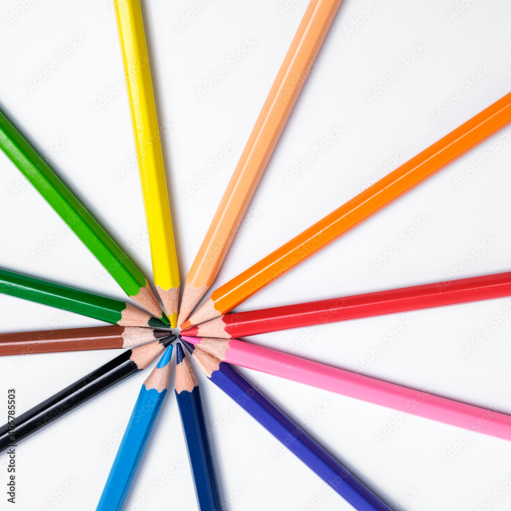 Multi-colored pencils on white background, palette of colors Multi-colored pencils on white background, palette of colors