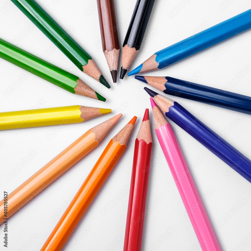 Multi-colored pencils on white background, palette of colors Multi-colored pencils on white background, palette of colors