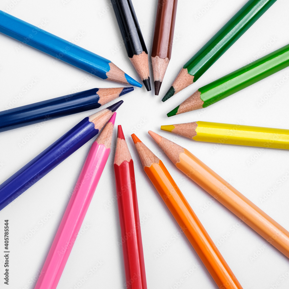 Multi-colored pencils on white background, palette of colors Multi-colored pencils on white background, palette of colors