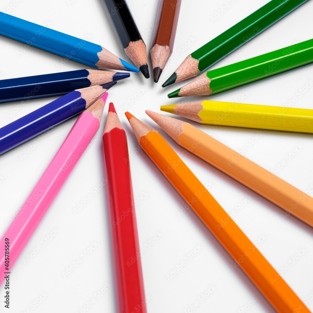 Multi-colored pencils on white background, palette of colors Multi-colored pencils on white background, palette of colors