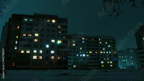 Wallpaper Mural Night time lapse of Light in the windows of a multistory building. life in a big city. Serenade of light Torontodigital.ca
