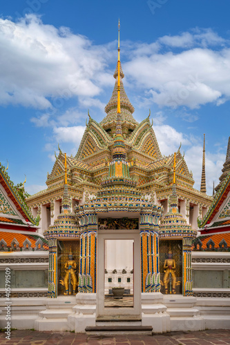 Beautiful famous giants infront of Wat Pho temple gate Thai art architecture famous place and travel attraction at Bangkok, Thailand. © pomphotothailand
