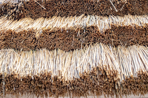 Straw thatching roof. Texture background.