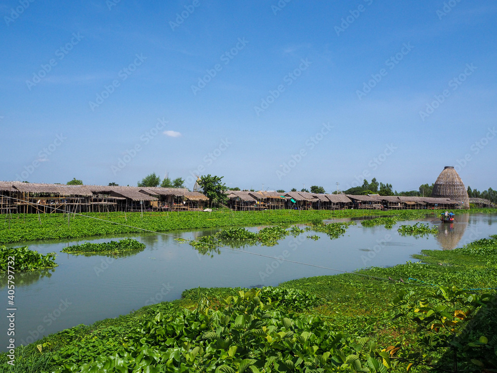 The good view of Riverside community and floating market,Tha Chin River, Thailand The good view of Riverside community and floating market,Tha Chin River, Thailand