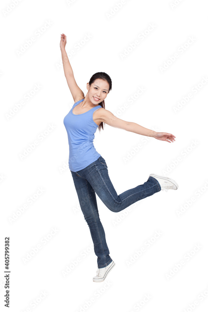 Portrait of a Young woman dancing smiling