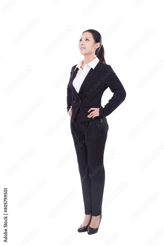Portrait of a businesswoman standing in a suit Portrait of a businesswoman standing in a suit