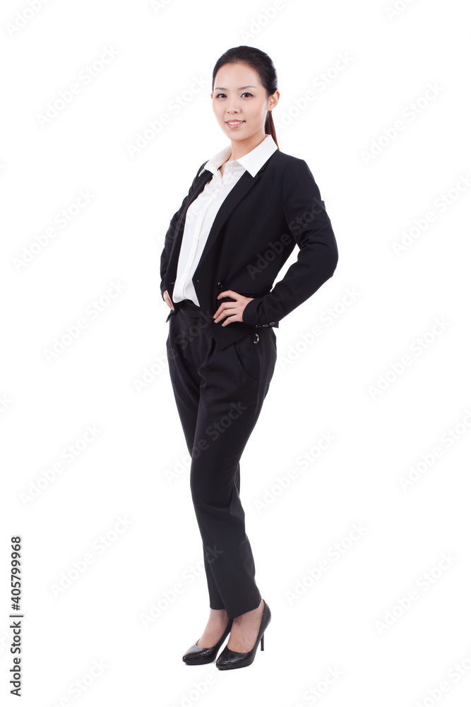 Portrait of a businesswoman standing in a suit Portrait of a businesswoman standing in a suit