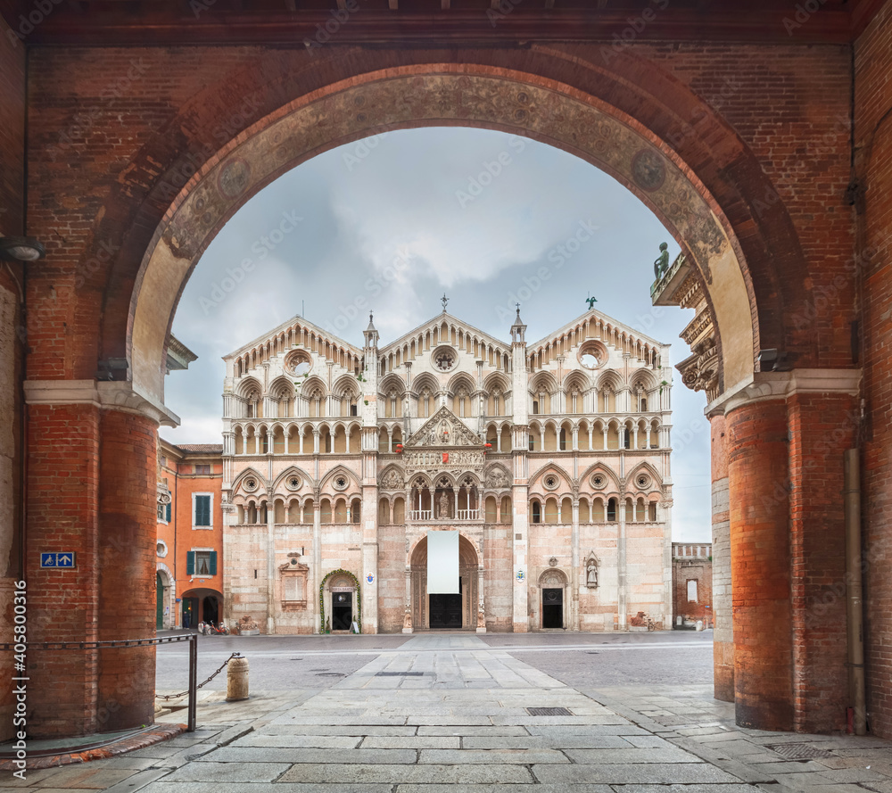 Ferrara, Italy. View of Cathedral through the arch (HDR-image)
