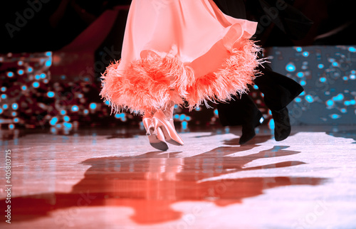 Man and woman dancer latino international dancing.  Ballroom dancing is a team sport. Vintage color filter.. photo