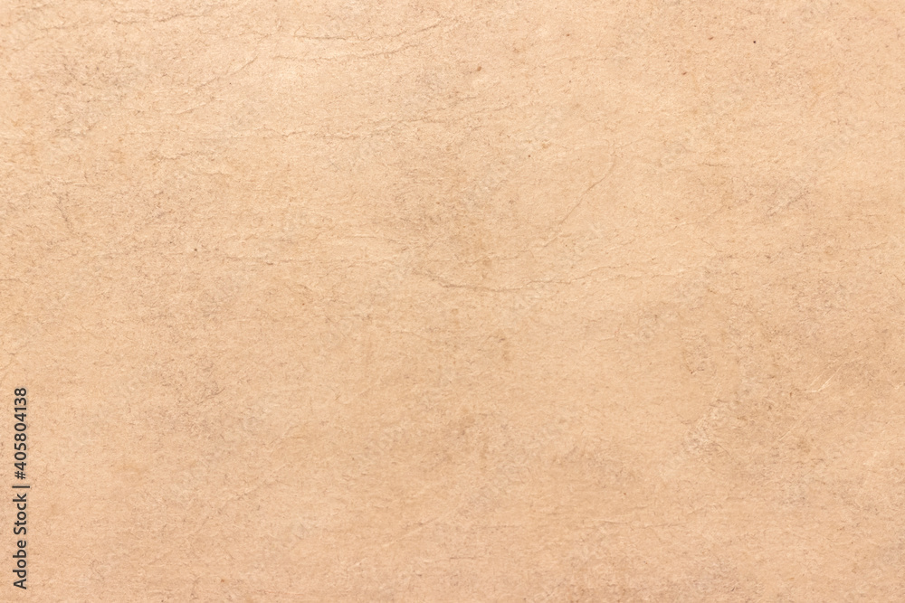 Old worn brown cardboard covered with stains. Old worn brown cardboard covered with stains.