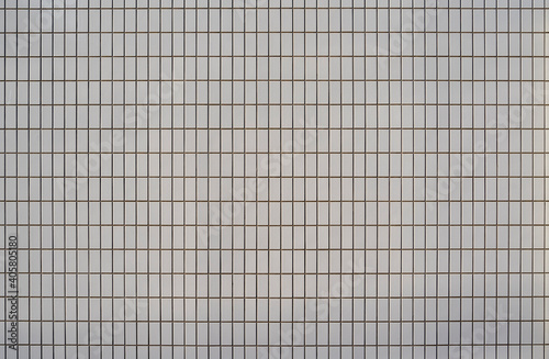 Texture  White tiles on a wall of a building