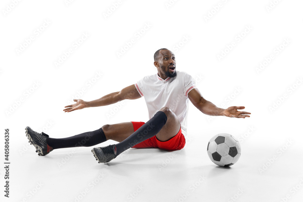 Highly upset, asking. Funny emotions of professional football, soccer player isolated on white studio background. Excitement in game, human emotions, facial expression and passion with sport concept. Highly upset, asking. Funny emotions of professional football, soccer player isolated on white studio background. Excitement in game, human emotions, facial expression and passion with sport concept.