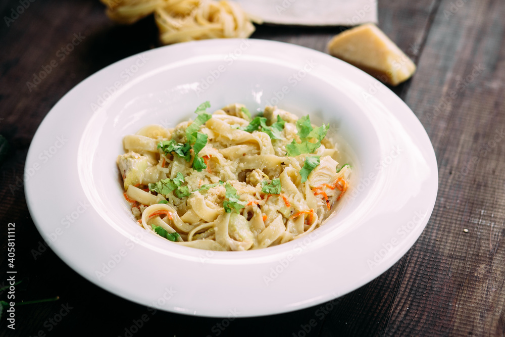 Parmesan pasta in a white plate Parmesan pasta in a white plate