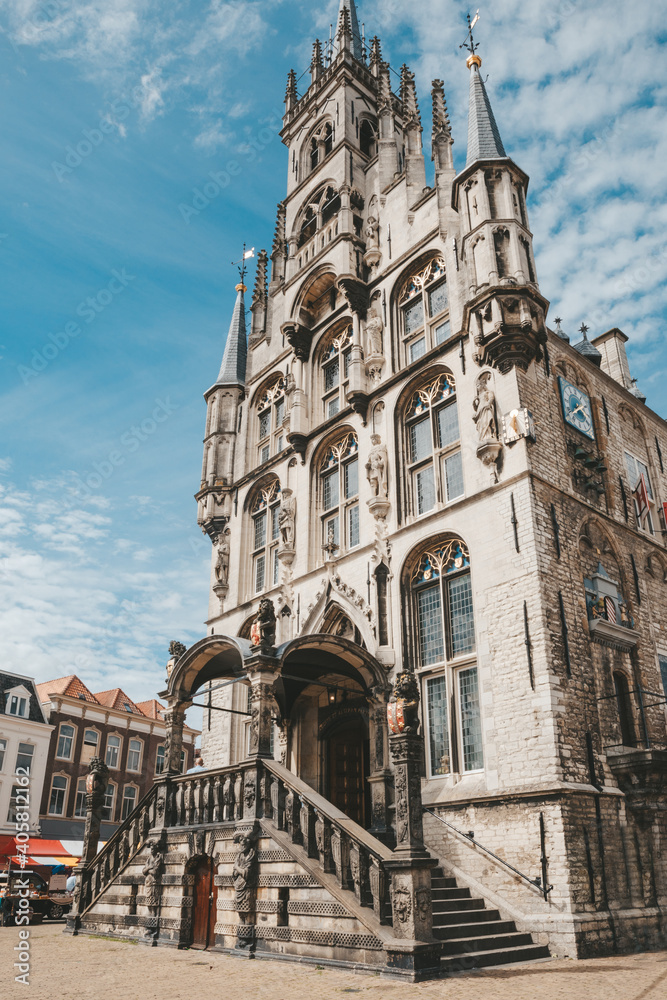 Obraz premium Gouda, Netherlands - July 20, 2020: Gouda Town Hall on Market square, Netherlands