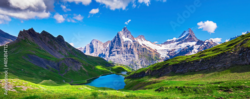 Sunrise  view on Bernese range above Bachalpsee lake. Popular tourist attraction. Location place Swiss alps, Grindelwald valley, Europe. 