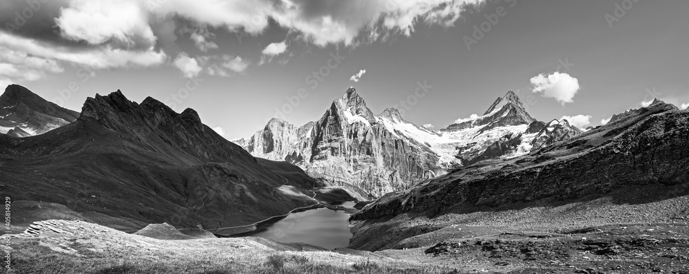 Sunrise view on Bernese range above Bachalpsee lake. Popular tourist attraction. Location place Swiss alps, Grindelwald valley, Europe.