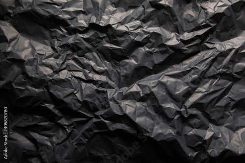 Grunge black paper background and crumpled paper texture, background for copy space