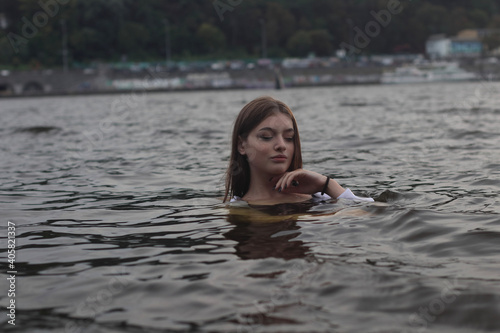 Fototapeta Naklejka Na Ścianę i Meble -  Women in sport outfin after swimming
