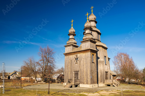 Traditional Wooden George's Church in Sedniv, Chernihiv region, Ukraine photo