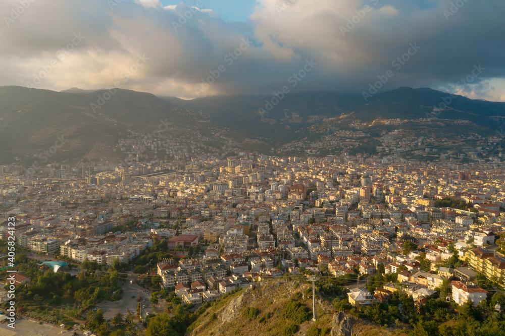Turkish city view in touristic place. An aerial view of the Alanya in Antalya Turkey with cloudy sky.