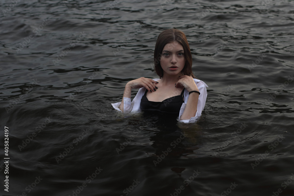 Fototapeta premium Attractive girl in the water