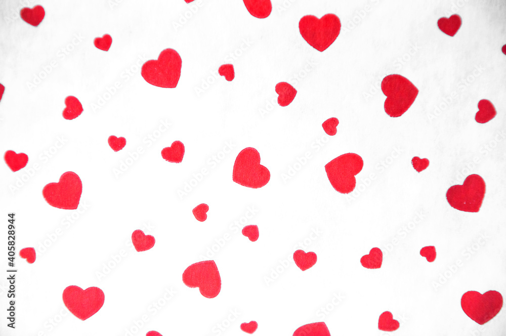 red hearts on white. valentine's day concept. texture with romantic hearts