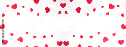 red hearts on white. valentine's day concept. texture with romantic hearts 