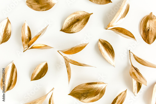Pattern, texture with gold leaves isolated on white background. flat lay, top view