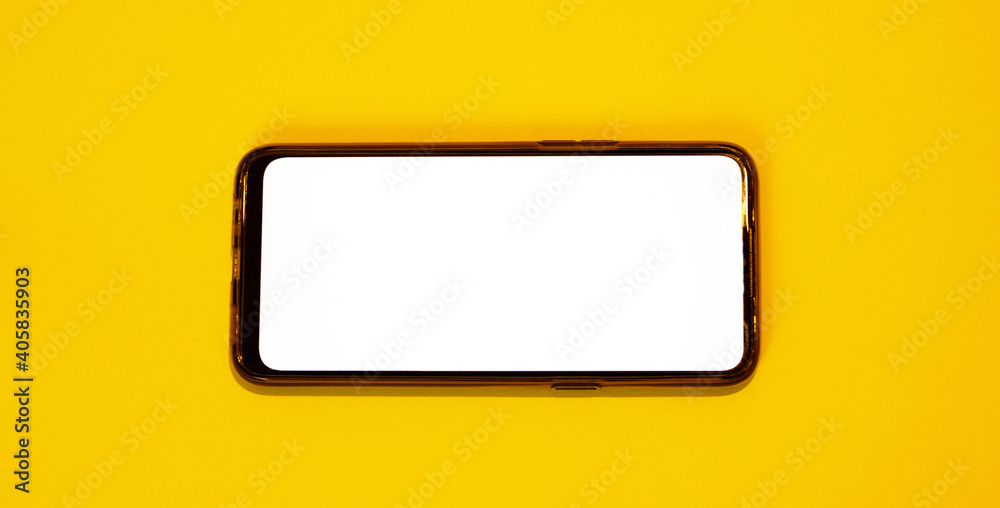 Blank template on concept smartphone with thin frames. Orange background with white frame for text. Blank template on concept smartphone with thin frames. Orange background with white frame for text.