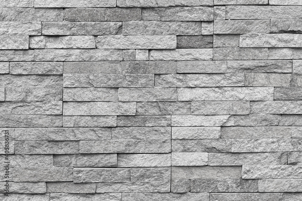 Fototapeta premium Natural facade stone decoration quartzite background texture. modern granite stone wall
