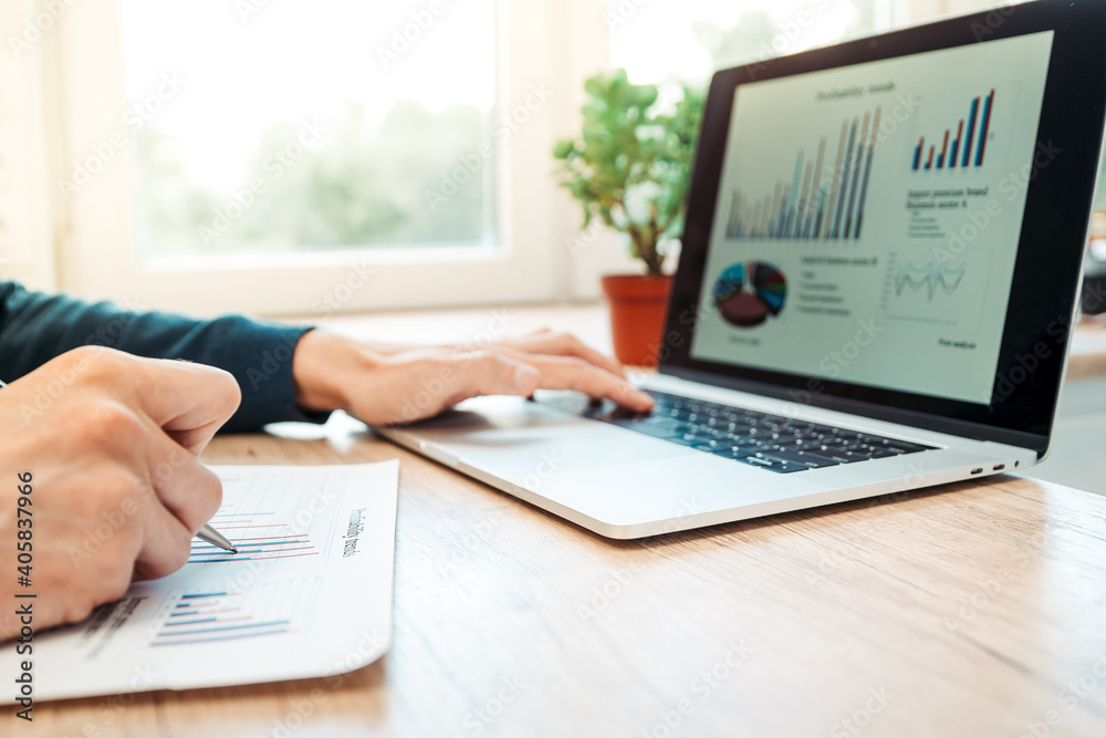 close up. business man analyzing financial charts. close up. business man analyzing financial charts.
