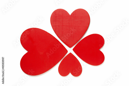Love symbols on Valentine day, red painted hearts on white top view