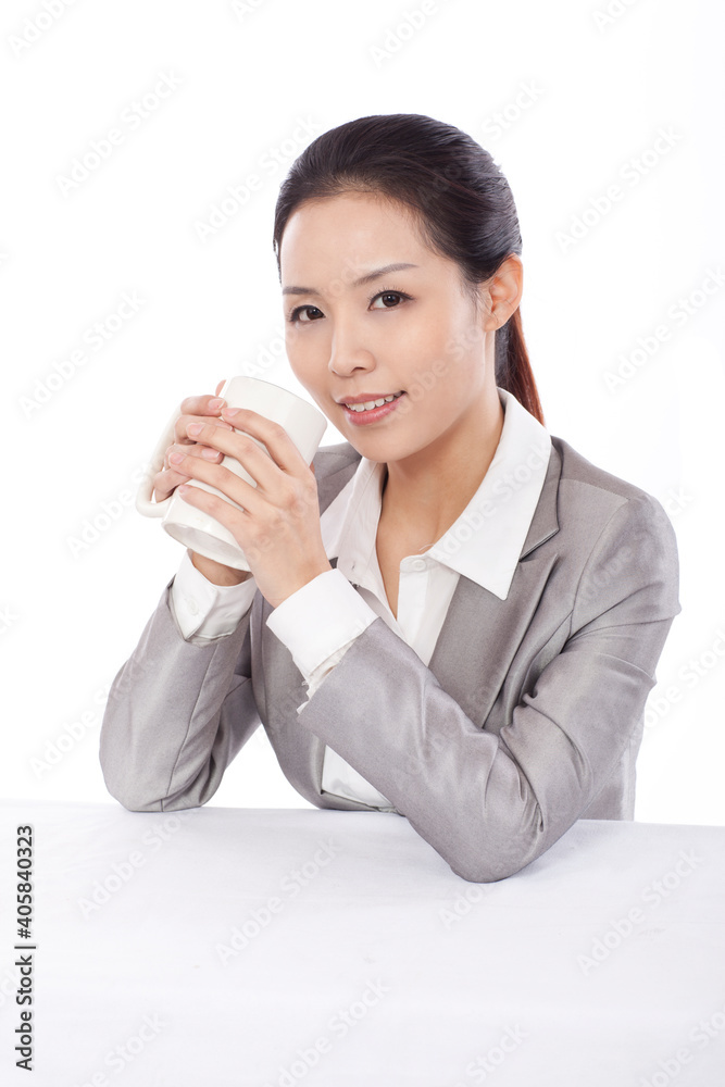 Smiling business woman holding mug smiling portrait Smiling business woman holding mug smiling portrait