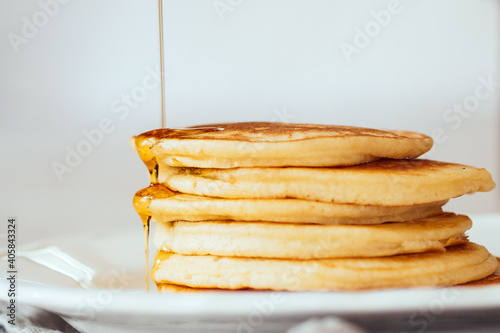 close up of pancakes on plate on table