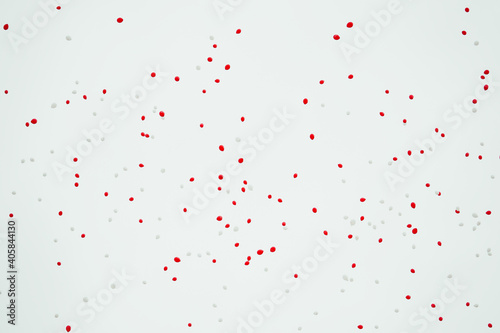 red ballons against white sky