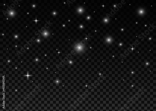 Glare on a dark background. Sequins, white glow. Flares of stars. Falling sparks.
