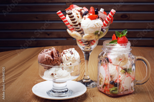 ice creams with berries and sauces